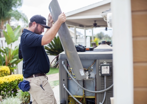 Technician Working On Unit